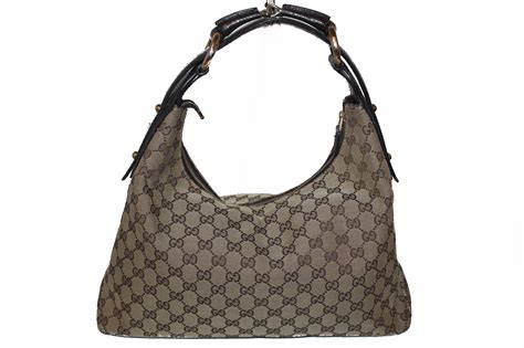 gucci bag women brown|Gucci brown leather shoulder bag.